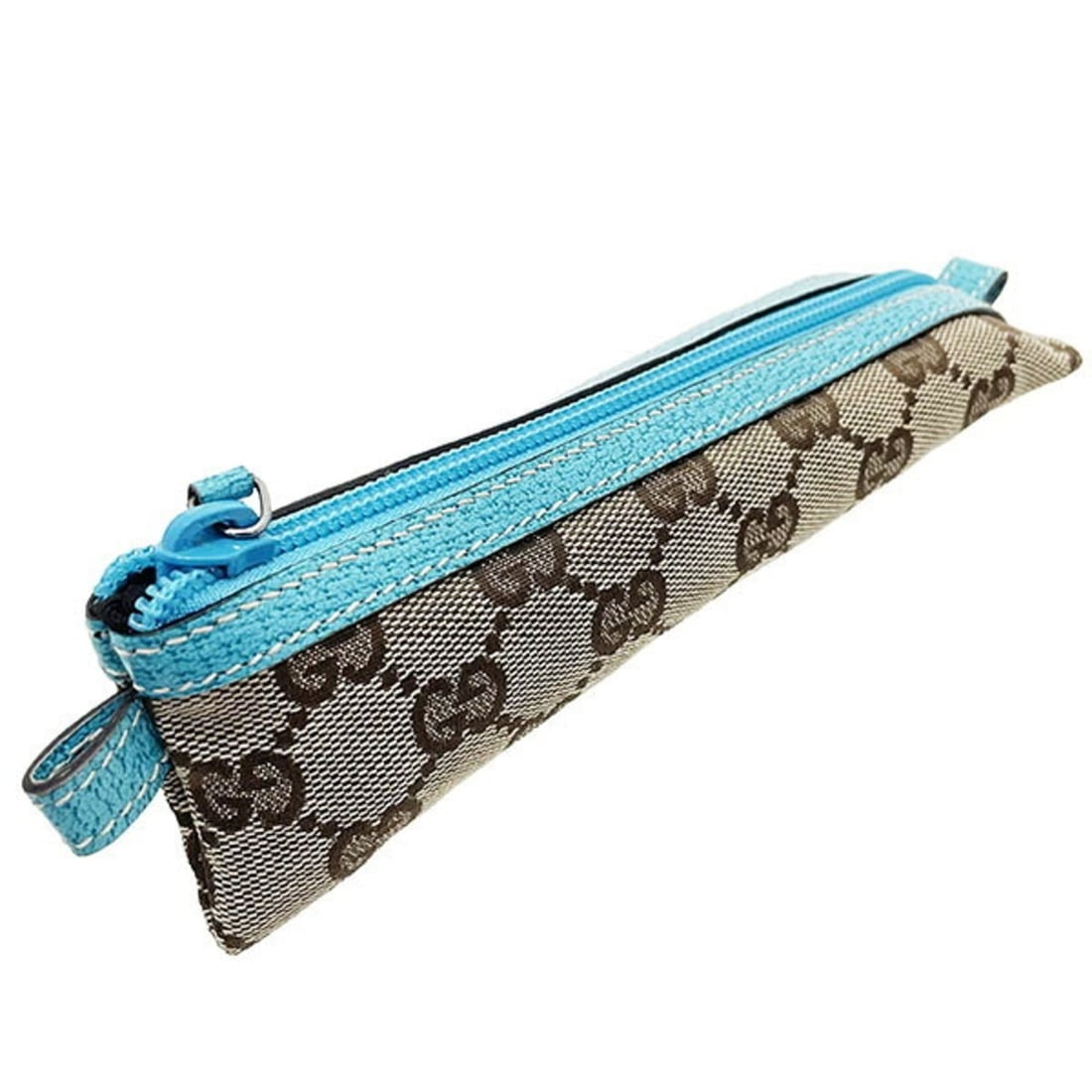 Gucci Pen Case GG Canvas Leather Beige Turquoise Blue 124543 Pouch: --- Catalog ---Category: SizeSize (LxWxD): 5.5cm x 18.5cm x 6cm / 2.16'' x 7.28'' x 2.36''Category: DesignType: Pen caseColor: Beige, Blue, TurquoiseMaterial: GG canvas, LeatherCategory: GeneralMPN: 1