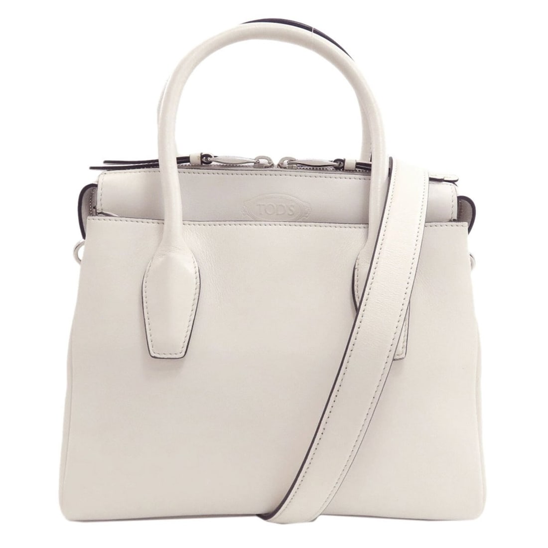 Tod's 2-Way Leather Handbag for Women: --- Catalog ---Category: SizeSize (HxWxD): 18.5cm x 25.5cm x 11.5cm / 7.28'' x 10.03'' x 4.52''Category: DesignType: HandbagColor: WhiteGender: WomenMaterial: Leather Category: GeneralBrand: Tod's--- 