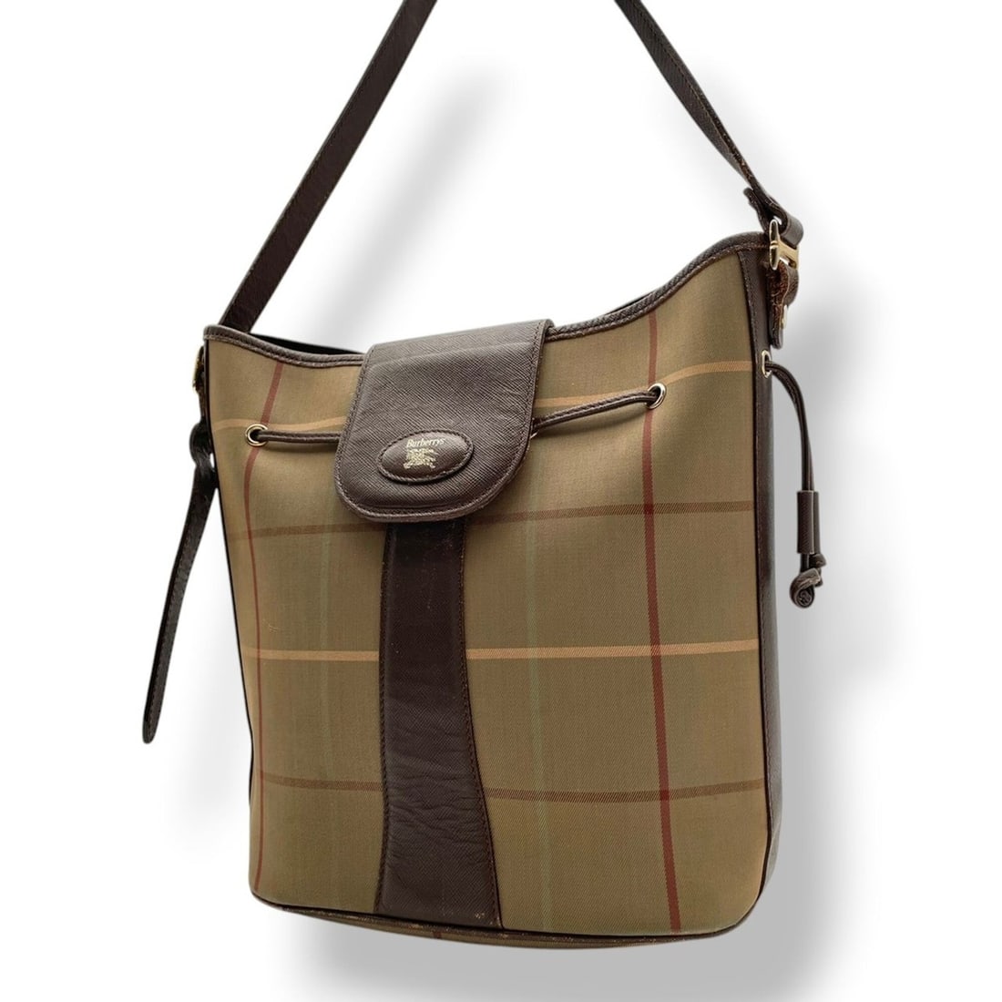 Burberry Nova Check Drawstring Shoulder Bag, Crossbody, Canvas and Leather, Beige/Brown, Gold: --- Catalog ---Category: SizeSize (HxWxD): 27cm x 28cm x 13cm / 10.62'' x 11.02'' x 5.11''Category: DesignType: Shoulder bagColor: Beige, BrownGender: WomenMaterial: Canvas , Leather Category: General