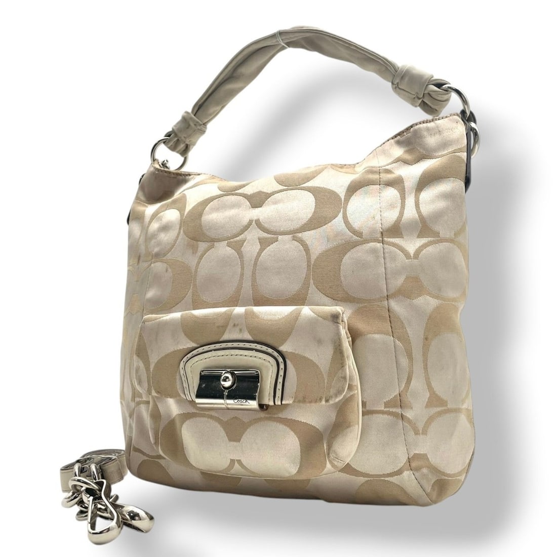 COACH Kristin Signature Satin Hobo Shoulder Bag Handbag Crossbody Canvas Leather Beige Silver: --- Catalog ---Category: SizeSize (HxWxD): 30cm x 33cm x 9cm / 11.81'' x 12.99'' x 3.54''Category: DesignType: Handbag, Shoulder bagColor: Beige, IvoryGender: WomenMaterial: Canvas , Leather Category:
