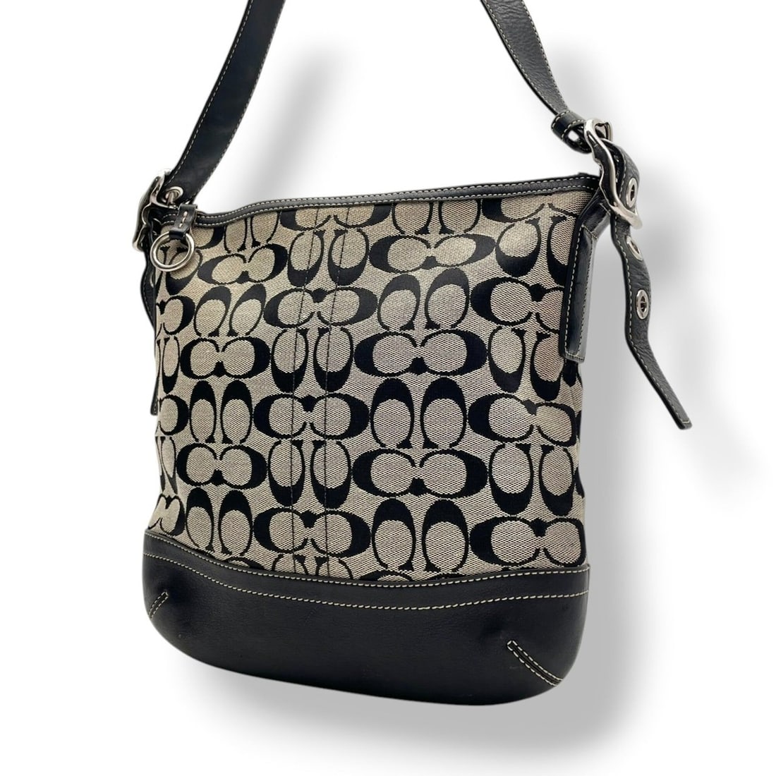 COACH Signature Duffle Shoulder Bag, Crossbody/Shoulder Canvas and Leather, Gray/Black, Silver: --- Catalog ---Category: SizeSize (HxWxD): 27cm x 27cm x 6cm / 10.62'' x 10.62'' x 2.36''Category: DesignType: Shoulder bagColor: Black, GrayGender: WomenMaterial: Canvas , Leather Category: GeneralBr