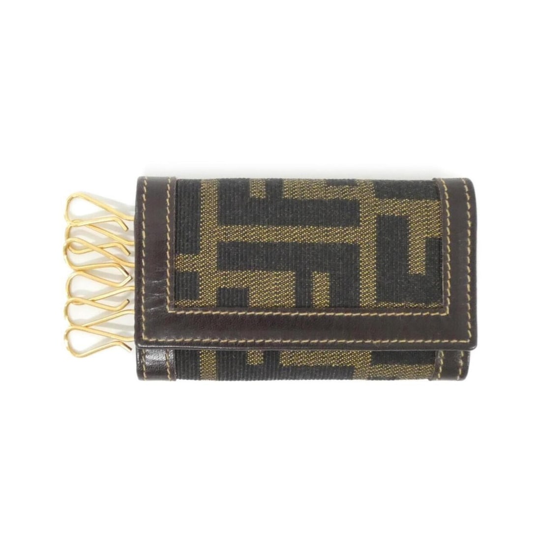 Fendi 10163 Key Case: --- Catalog ---Category: DesignType: KeycaseColor: BrownGender: WomenMaterial: Canvas Category: GeneralBrand: FendiCategory: Physical PropertiesSize (HxWxD): 6cm x 9.5cm x 2cm / 2.36'' x 3.74'' x