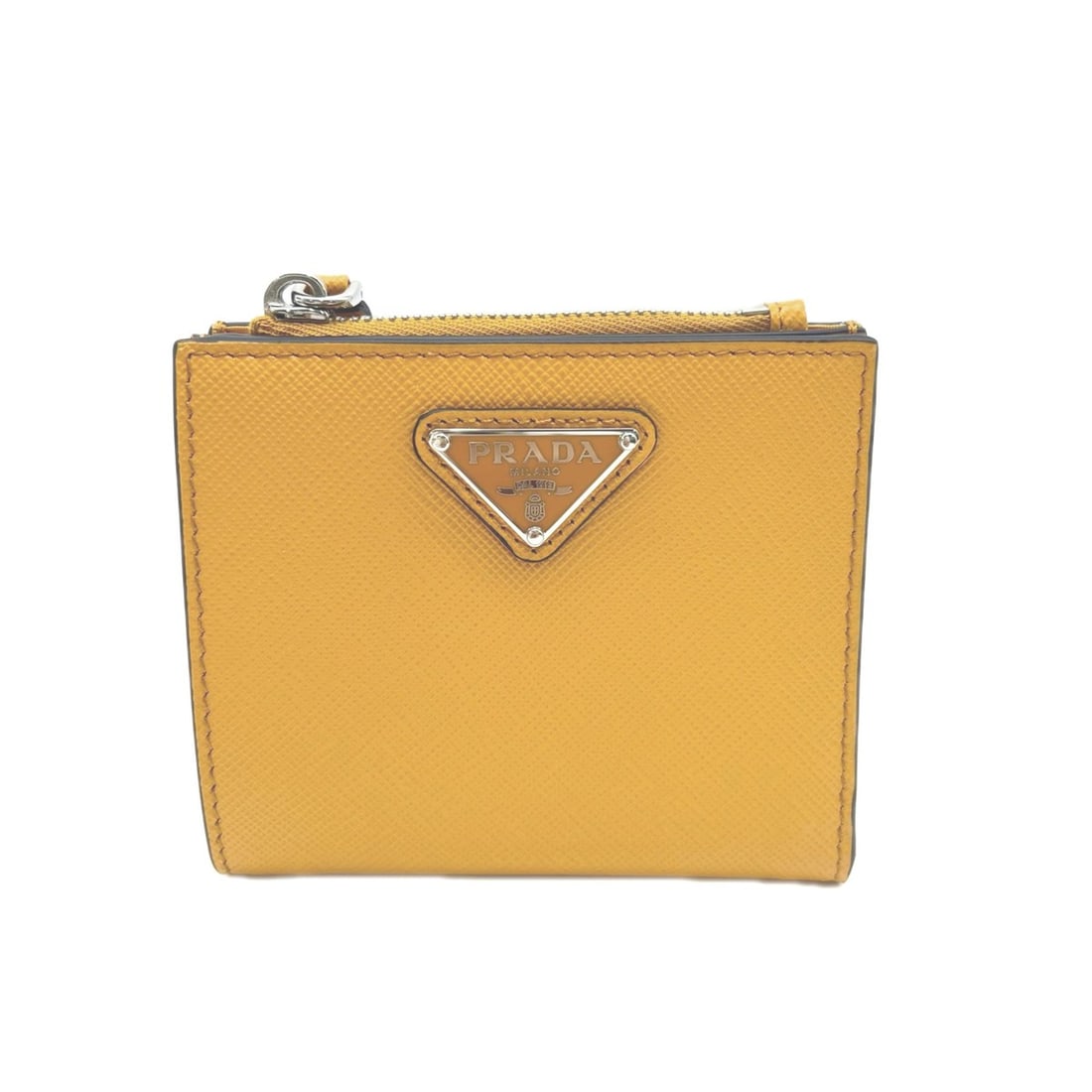 PRADA Saffiano Triangle Wallet Amber 2ML049 Bi-fold Orange Women's: --- Catalog ---Category: SizeSize (HxWxD): 10cm x 9cm x 2cm / 3.93'' x 3.54'' x 0.78''Category: DesignType: Wallet (bi-fold)Color: OrangeGender: WomenMaterial: Saffiano triangle Category: GeneralBrand