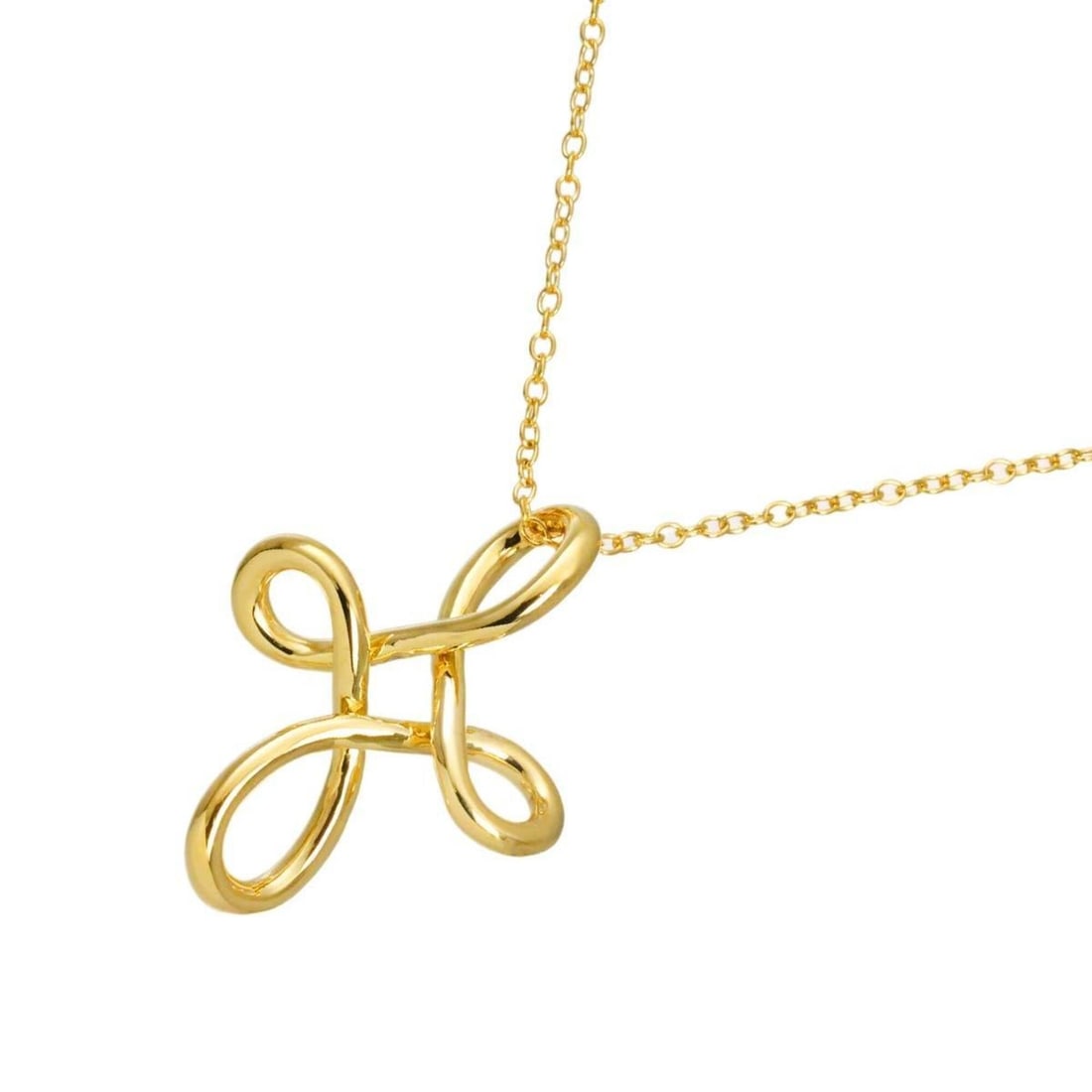 Tiffany & Co. Infinity Cross Long Necklace, 66cm, 18K Yellow Gold (750): --- Catalog ---Category: SizePendant Size: 32mm x 24.5mm / 1.25'' x 0.96''Neck Circumference: 66 cm / 25.98''Category: DesignGender: WomenMaterial: Yellow gold (18K)Necklace Type: NecklaceCategory: Ge