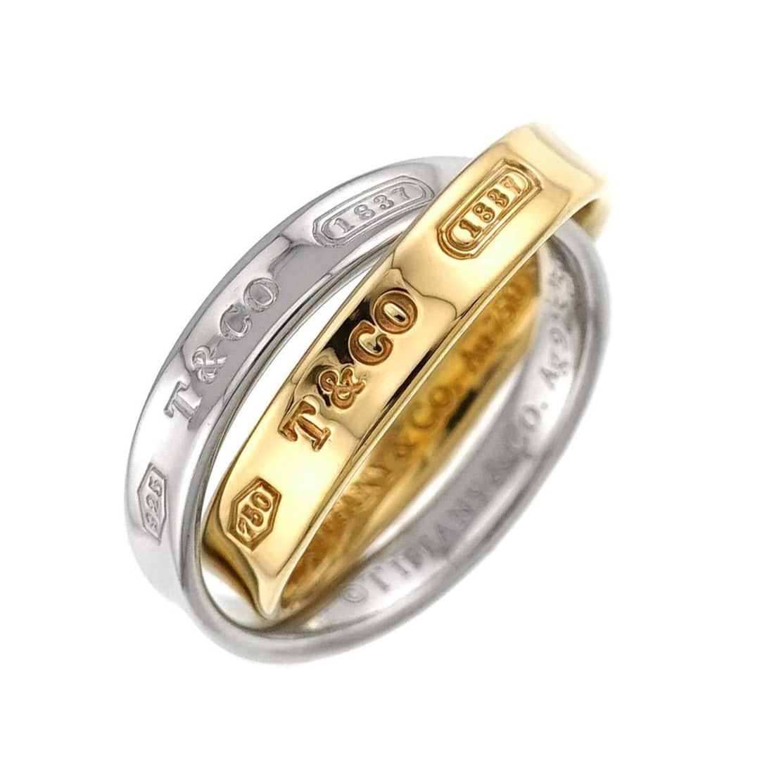 Tiffany & Co. Interlocking Ring #50, 18K Yellow Gold and 750 Silver, 1837: --- Catalog ---Category: SizeJP Size: 10US Size: 5.5Category: DesignType: Band ringGender: WomenMaterial: Yellow gold (18K)Category: GeneralBrand: Tiffany--- Item List ---Section: ConditionRanking: Ra