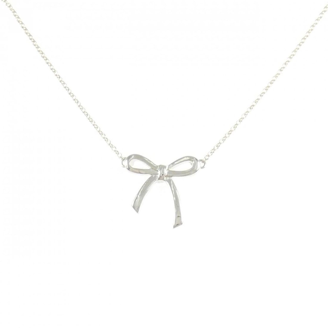 Tiffany Bow Necklace: --- Catalog ---Category: SizePendant Size: 14.1mm x 14.6mm / 0.55'' x 0.57''Neck Circumference: 40 cm / 15.74''Category: DesignColor: SilverGender: WomenMaterial: Silver 925Pendant Type:
