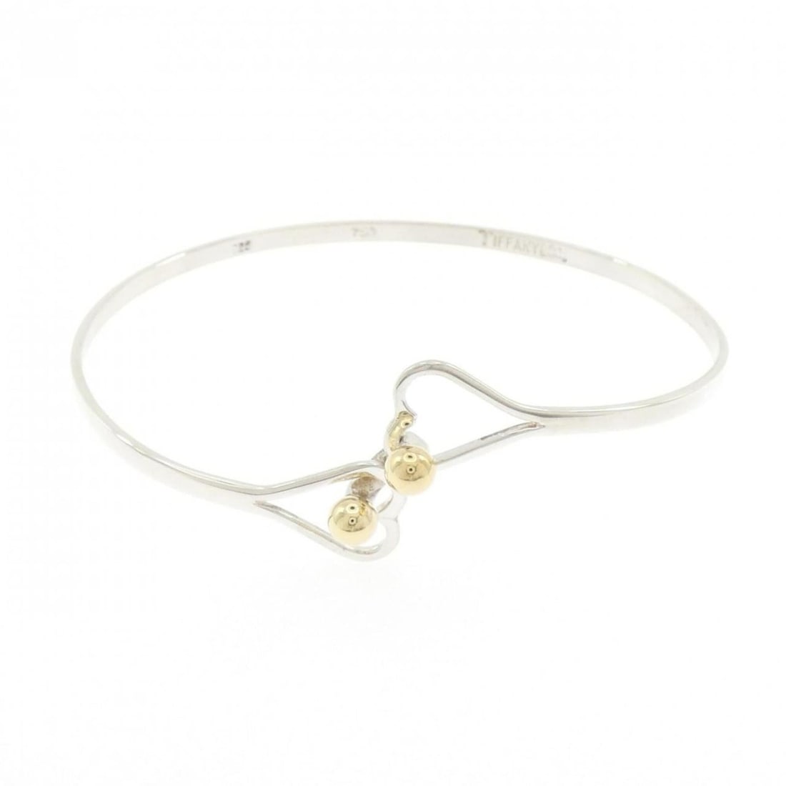 Tiffany & Co. 925 750YG Bangle: --- Catalog ---Category: SizeLength: 16cm / 6.29''Category: DesignType: BangleColor: Silver, Yellow goldGender: WomenMaterial: Silver 925, Yellow gold (18K)Category: GeneralBrand: Tiffany--- Item List