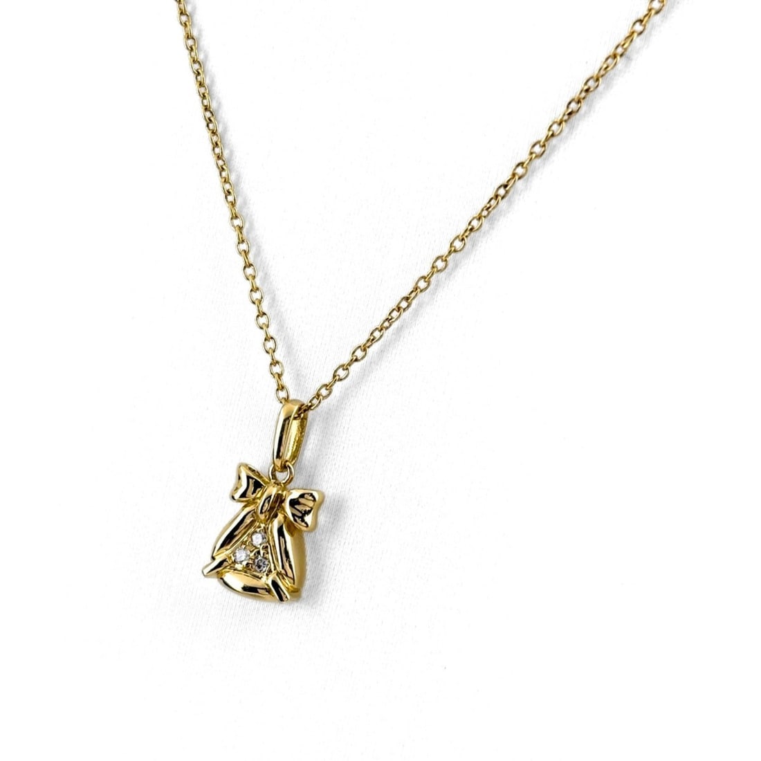 Christian Dior ribbon motif yellow gold pendant necklace with small diamonds (750 diamond) for