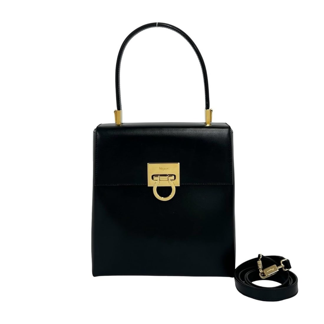 Salvatore Ferragamo Gancini Leather 2-way Shoulder Bag/Handbag, Black, 27742: --- Catalog ---Category: SizeSize (HxWxD): 20cm x 19cm x 8cm / 7.87'' x 7.48'' x 3.14''Category: DesignType: Handbag, Shoulder bagColor: BlackGender: WomenMaterial: Leather Category: GeneralBrand: Sal