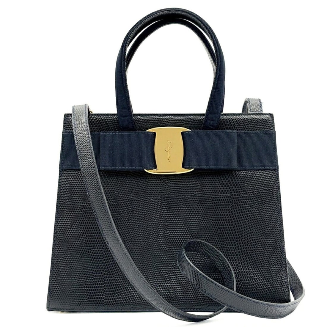 Salvatore Ferragamo Vara 2-way Leather Bag, Black/Navy, Ribbon, BA214178: --- Catalog ---Category: SizeSize (HxWxD): 21cm x 24cm x 9cm / 8.26'' x 9.44'' x 3.54''Category: DesignType: HandbagColor: BlackGender: Women,MenMaterial: Leather Category: GeneralBrand: Salvatore Fer