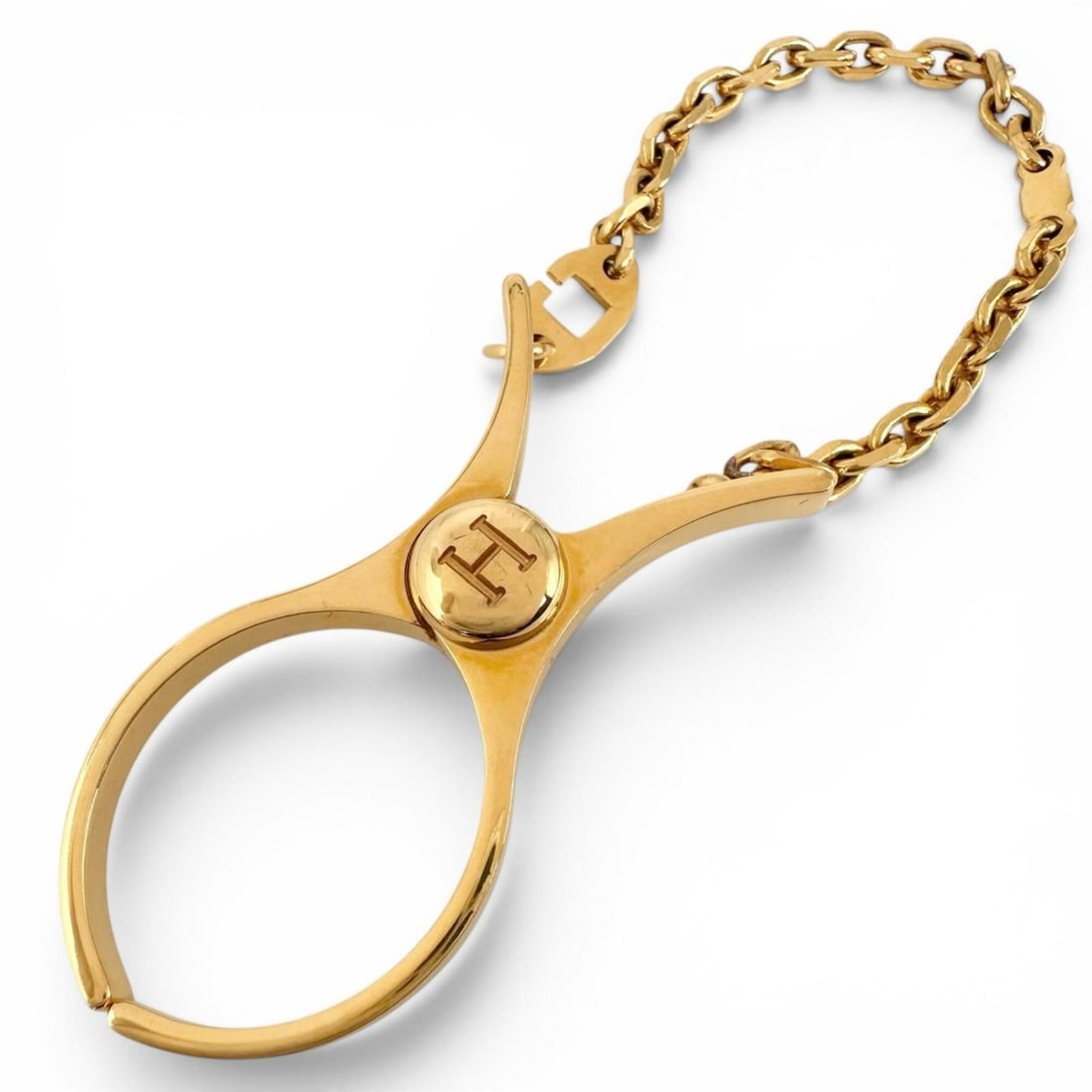 HERMES FILOU H-logo Glove Holder with Strap, Gold, Women's: --- Catalog ---Category: DesignType: Glove holderColor: GoldGender: WomenCategory: GeneralBrand: Hermes--- Item List ---Section: ConditionRanking: Rank A Used - A few traces of usage, some scratches /