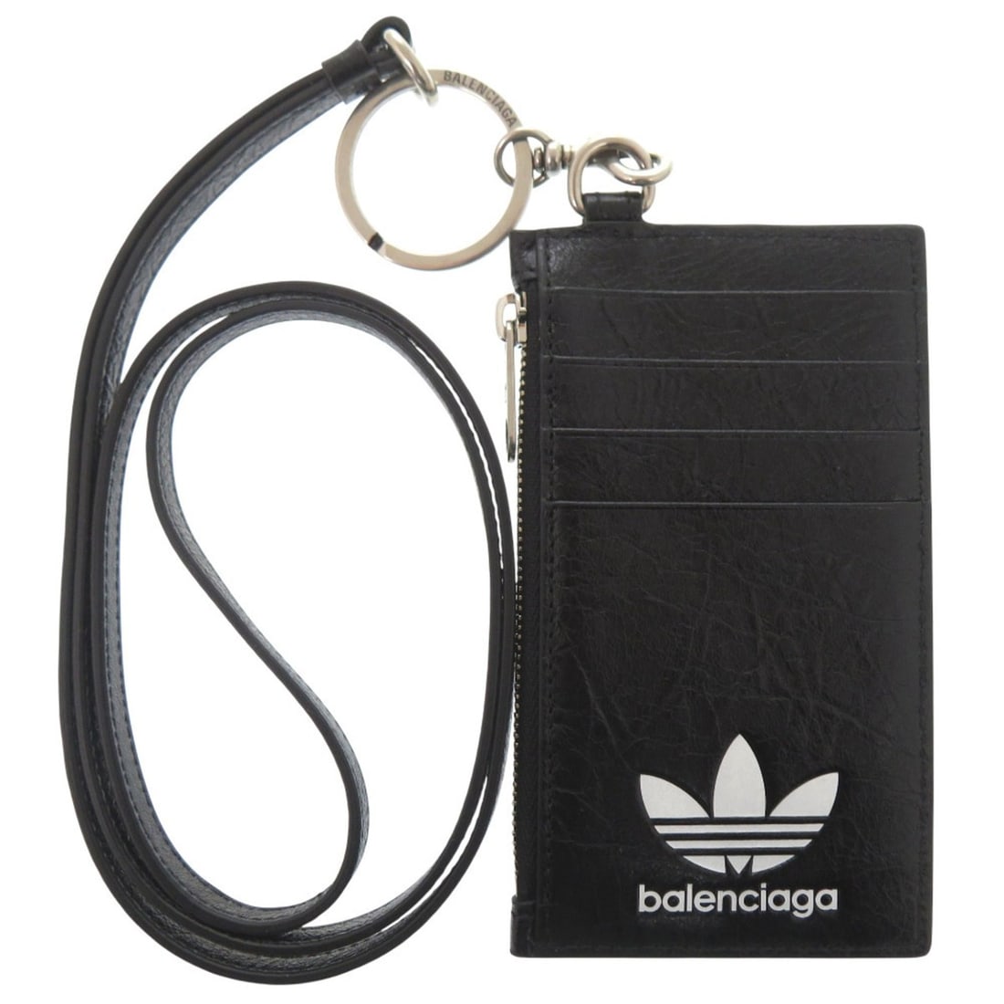 Balenciaga x Adidas Collaboration Trefoil 721894 Leather Black Shoulder Wallet 1288BALENCIAGA: --- Catalog ---Category: SizeSize (HxWxD): 7.5cm x 13cm / 2.95'' x 5.11''Category: DesignType: Shoulder bagColor: Black, WhiteGender: MenMaterial: Leather Category: GeneralMPN: 721894Brand: Balenciaga