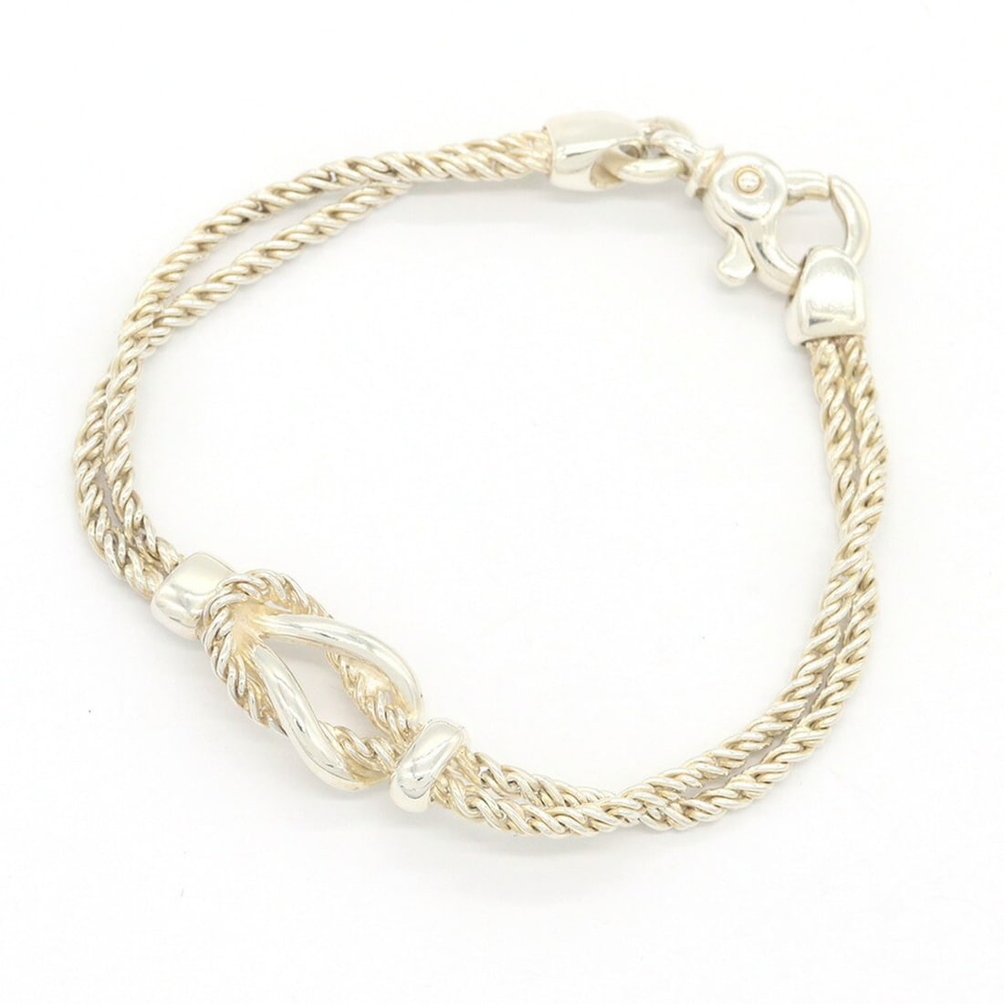 Tiffany & Co. Bracelet, Center Knot Double Rope, Sterling Silver 925 Bangle, Knot, Twist, Screw,: --- Catalog ---Category: SizeLength: 18cm / 7.08''Category: DesignType: Charm braceletGender: WomenMaterial: Sterling silver 925Category: GeneralBrand: Tiffany--- Item List ---Section: ConditionRankin