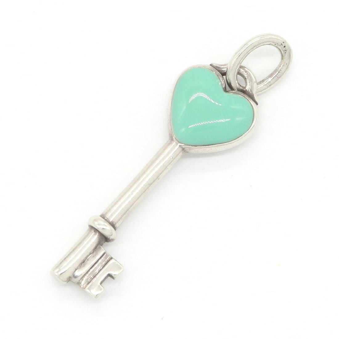 Tiffany & Co. Heart Key Pendant Top, Sterling Silver 925, Enamel Necklace Choker, for Women.: --- Catalog ---Category: SizePendant Size: 32mm x 9mm / 1.25'' x 0.35''Category: DesignColor: Blue, SilverGender: WomenMaterial: Enamel, Sterling silver 925Necklace Type: PendantCategory: