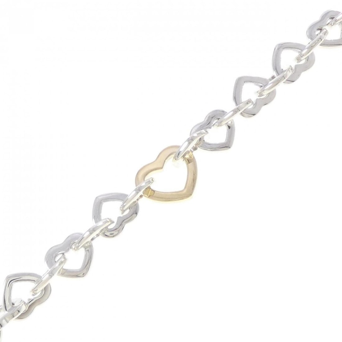 Tiffany Heart Link Bracelet: --- Catalog ---Category: SizeLength: 19cm / 7.48''Category: DesignType: Link braceletGender: WomenMaterial: Silver 925, Yellow gold (18K)Category: GeneralBrand: Tiffany--- Item List ---Section: