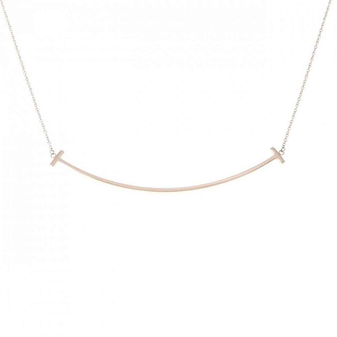 Tiffany & Co. T Smile Large Necklace: --- Catalog ---Category: SizePendant Size: 6mm x 68.7mm / 0.23'' x 2.7''Neck Circumference: 41 cm - 46 cm / 16.14'' - 18.11''Category: DesignGender: WomenMaterial: Pink gold (18K)Pendant Type: