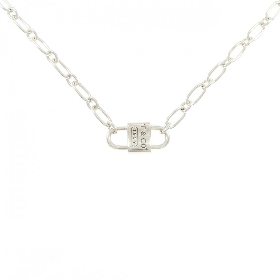 Tiffany & Co. 1837 Small Double Lock Necklace: --- Catalog ---Category: SizePendant Size: 9.4mm / 0.37''Neck Circumference: 46 cm / 18.11''Category: DesignGender: WomenMaterial: Silver 925Necklace Type: NecklaceCategory: GeneralBrand: Tiffany---