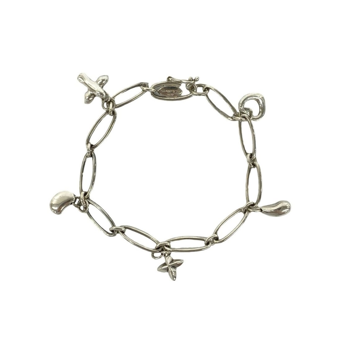 TIFFANY&Co. Tiffany Vintage 5 Charm Bracelet, Sterling Silver 925 Chain Accessory, 80677: --- Catalog ---Category: SizeLength: 16.5cm / 6.49''Category: DesignType: Charm braceletColor: SilverGender: WomenMaterial: Silver 925Category: GeneralBrand: Tiffany--- Item List ---Section: Condition