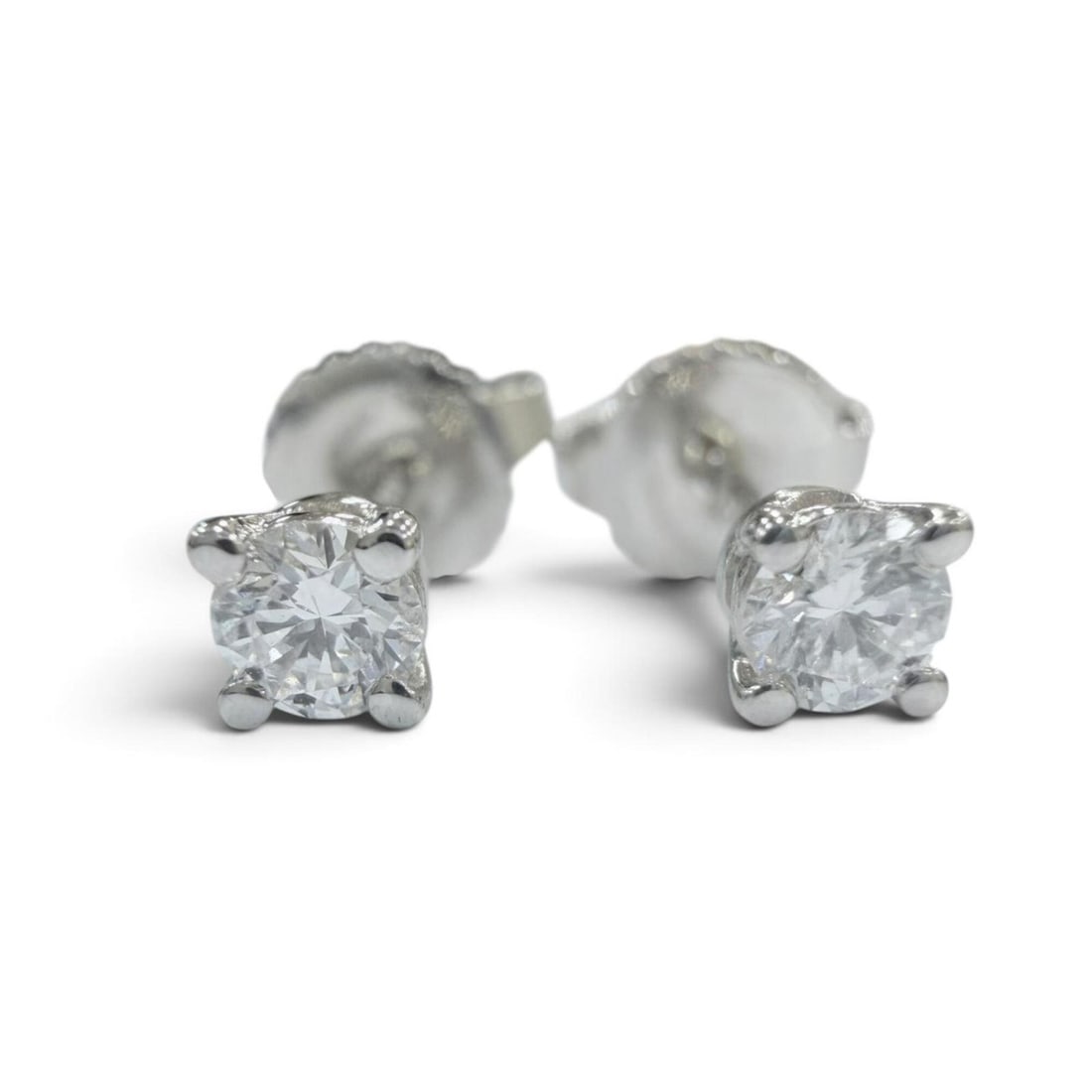 TIFFANY&Co. Tiffany Stud Diamond Earrings, PT950 Platinum, Total Weight: 1.31g, Purchased May 2011,: --- Catalog ---Category: DesignType: Stud earringsColor: PlatinumStone: DiamondGender: WomenMaterial: Platinum 950Category: GeneralBrand: Tiffany--- Item List ---Section: ConditionRanking: Rank SA Use