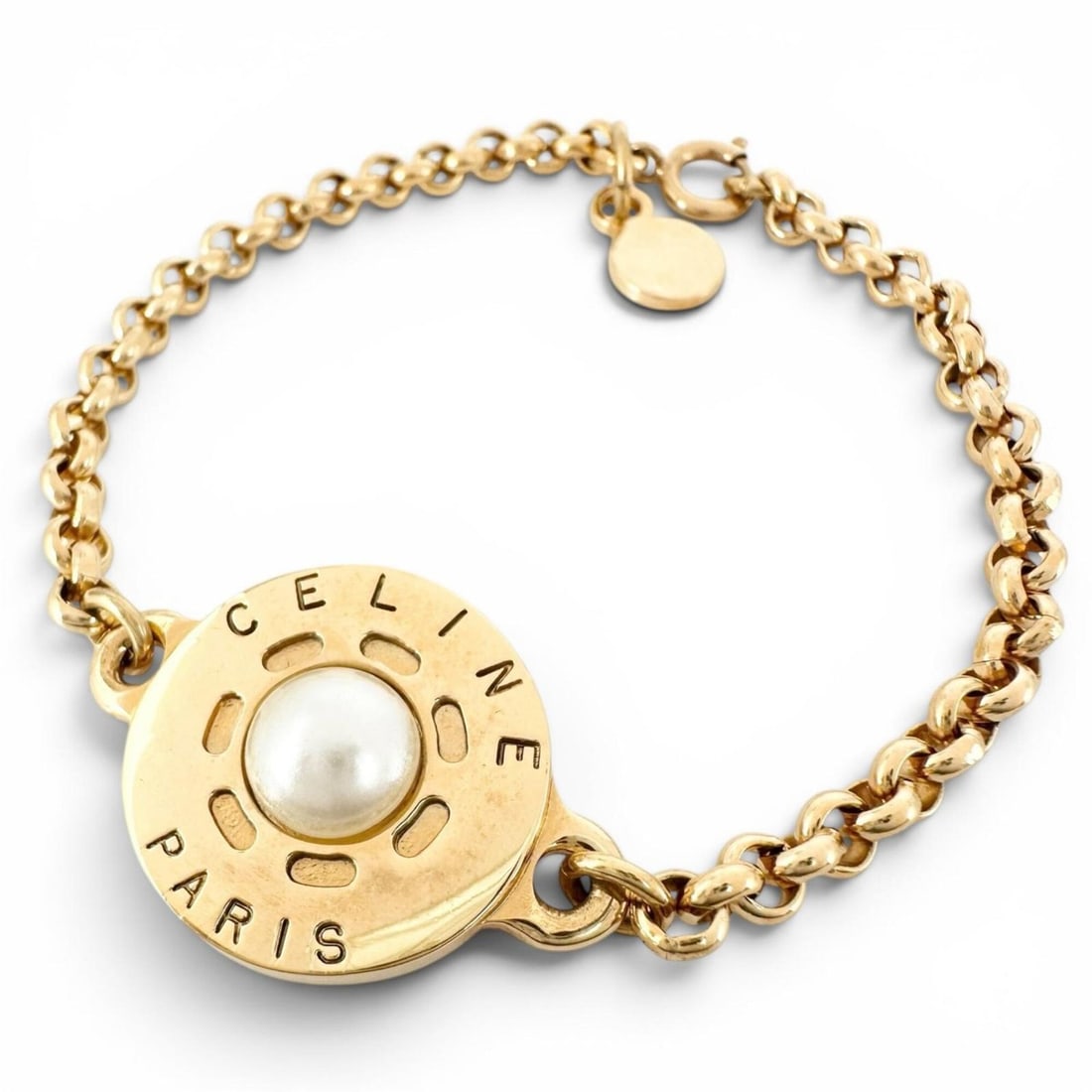 CELINE Vintage Faux Pearl Plated Circle Logo Bracelet, Gold, Made in France, Women's: --- Catalog ---Category: SizeLength: 18cm / 7.08''Category: DesignType: Charm braceletColor: GoldGender: WomenCategory: GeneralBrand: CelineCountry of Origin: France--- Item List ---Section: Condition