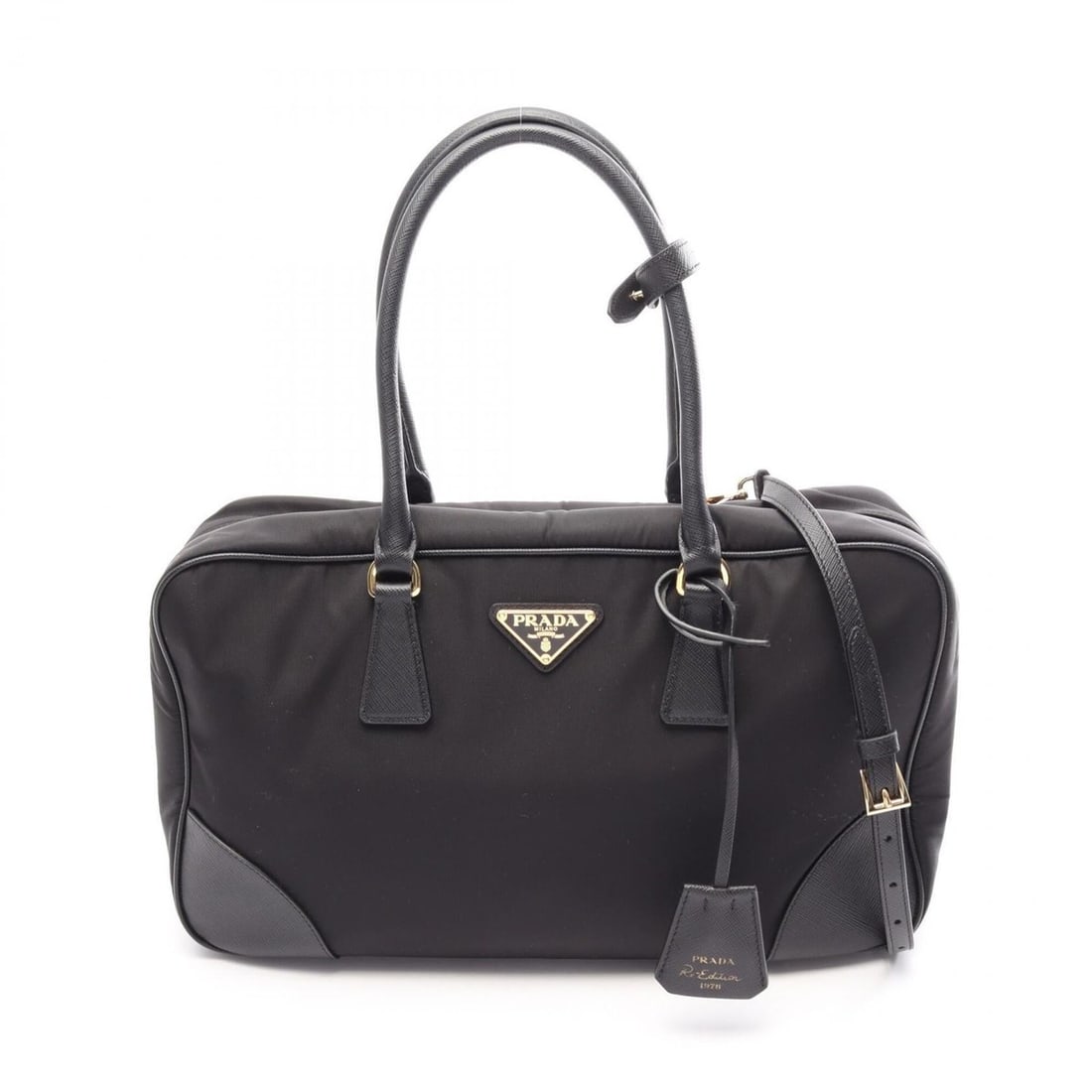 Prada Re-Edition 1978 Medium 2-Way Handbag, Nylon & Saffiano Leather, Women's, Black (1BB114): --- Catalog ---Category: SizeSize (HxWxD): 20cm x 35cm x 10cm / 7.87'' x 13.77'' x 3.93''Category: DesignType: HandbagColor: BlackGender: WomenMaterial: Nylon , Saffiano triangle Category: GeneralMPN: