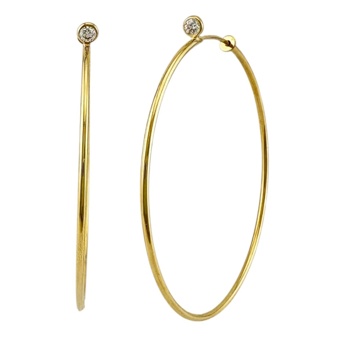 Tiffany & Co. Diamond Hoop Earrings, 18K Yellow Gold, Diamonds, Women's, Pre-owned.: --- Catalog ---Category: SizeWeight: 2.8g / 0.09oz.Size (HxWxD): 46.50mm x 3.00mm / 1.83'' x 0.12''Category: DesignType: Hoop earringsStone: DiamondGender: WomenHandmade: YesMaterial: Yellow gold (18K