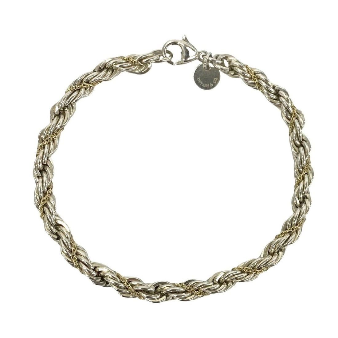 TIFFANY&Co. Tiffany Vintage Twist Rope Bracelet, Sterling Silver 925, 18K Gold, Silver, 85736: --- Catalog ---Category: SizeLength: 17cm / 6.69''Category: DesignType: Charm braceletColor: Gold, SilverGender: WomenMaterial: Gold (18K), Silver 925Category: GeneralBrand: Tiffany--- Item List ---Se