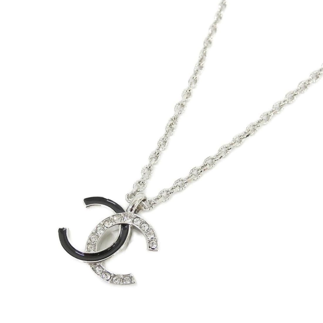 Chanel ABF793 Necklace: --- Catalog ---Category: SizePendant Size: 22mm x 23mm / 0.86'' x 0.9''Neck Circumference: 42 cm - 48.5 cm / 16.53'' - 19.09''Category: DesignColor: BlackGender: WomenMaterial: SilverNecklace Type: