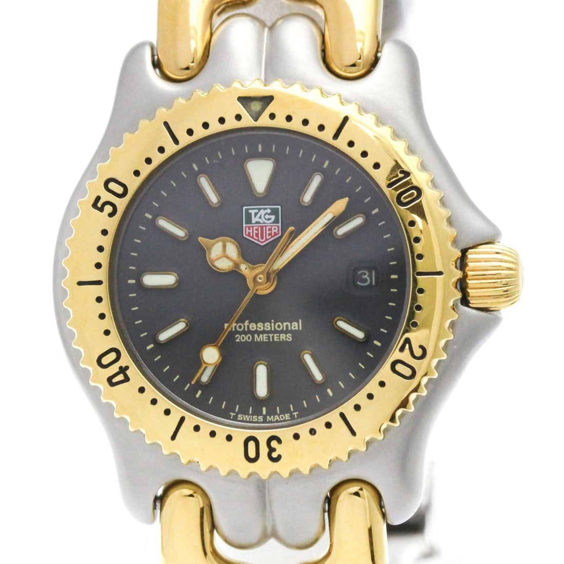 TAG HEUER Sel Professional 200M Gold Plated Steel Ladies Watch S95.215 Polished: --- Catalog ---Category: SizeCase Diameter: 28mm / 1.1''Category: DesignType: WristwatchStyle: Dress/FormalGender: WomenColor (Dial): GrayMaterial (Band): Gold plated, Stainless steelMaterial (Case): 