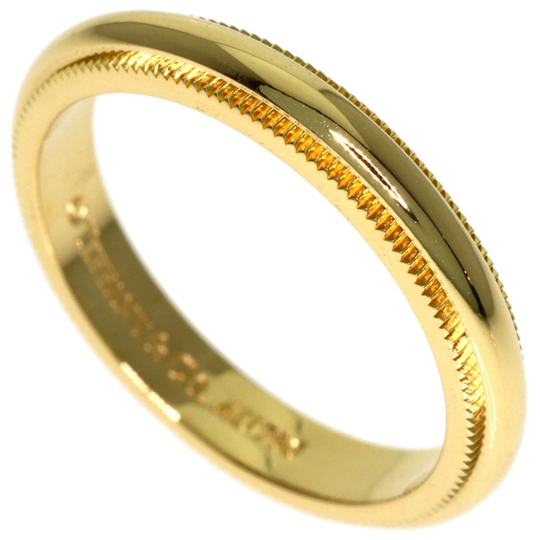 Tiffany & Co. Milgrain Ring, 18K Yellow Gold, Women's.: --- Catalog ---Category: SizeWidth: 3mm / 0.12''Weight: 3.4g / 0.11oz.JP Size: 9US Size: 5Category: DesignType: Band ringGender: WomenMaterial: Yellow gold (18K)Category: GeneralBrand: Tiffany--- Item