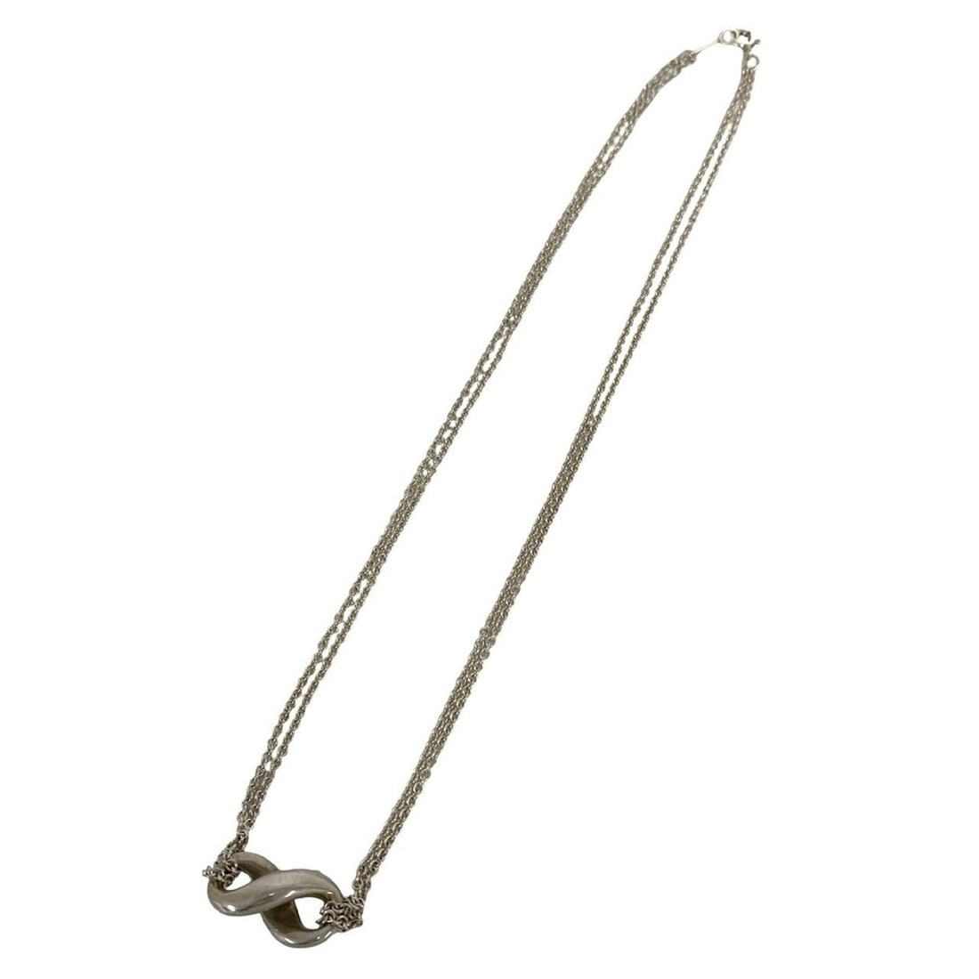 TIFFANY&Co. Tiffany Vintage Infinity Necklace, Sterling Silver 925 Pendant, Accessory, 65964: --- Catalog ---Category: SizePendant Size: 9mm x 18mm / 0.35'' x 0.7''Neck Circumference: 39.5 cm / 15.55''Category: DesignColor: SilverGender: WomenMaterial: Silver 925Pendant Type: PendantNecklace T