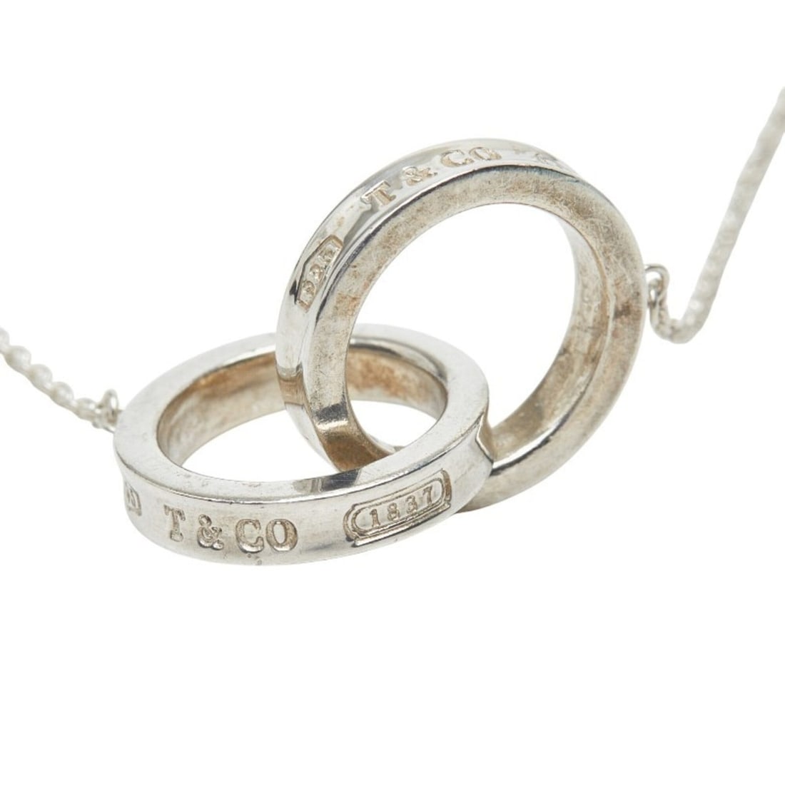 Tiffany & Co. 1837 Interlocking Chain Circle Pendant Necklace, SV925 Silver, Women's.: --- Catalog ---Category: SizePendant Size: 14.1mm x 25mm / 0.55'' x 0.98''Neck Circumference: 41 cm / 16.14''Category: DesignGender: WomenMaterial: Silver 925Pendant Type: PendantNecklace Type: Neckla