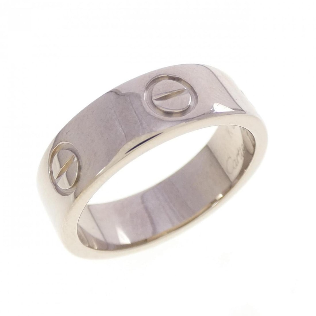 Cartier Love Ring: --- Catalog ---Category: SizeUS Size: 6.5Brand Size: 52Category: DesignType: Band ringGender: WomenMaterial: White gold (18K)Category: GeneralMPN: B4084700Brand: Cartier--- Item List ---Section: