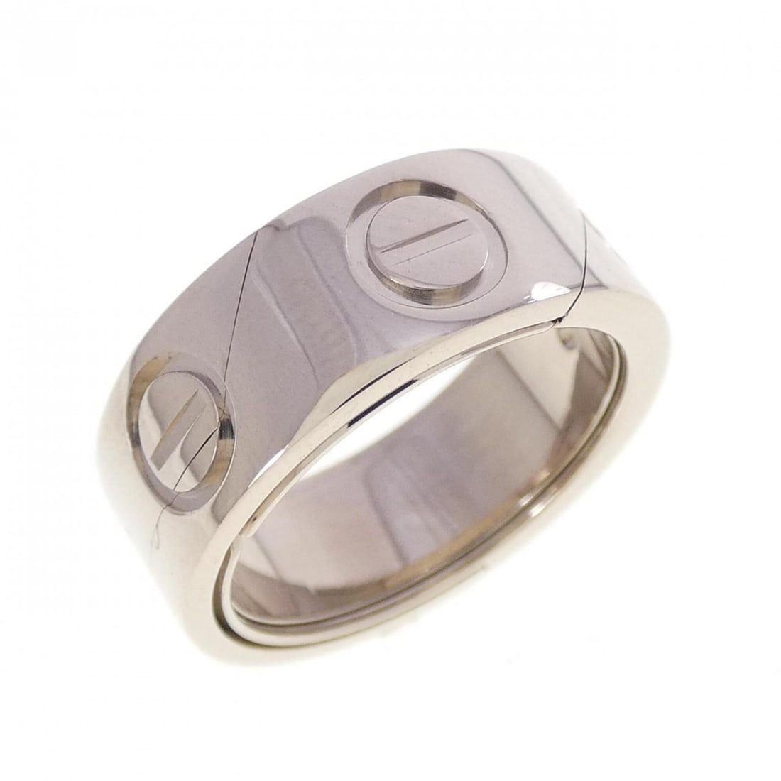 Cartier Astrolove 1999 Christmas Limited Edition Ring: --- Catalog ---Category: SizeUS Size: 5Brand Size: 49Category: DesignType: Band ringGender: WomenMaterial: White gold (18K)Category: GeneralMPN: B40393Brand: Cartier--- Item List ---Section: Condition