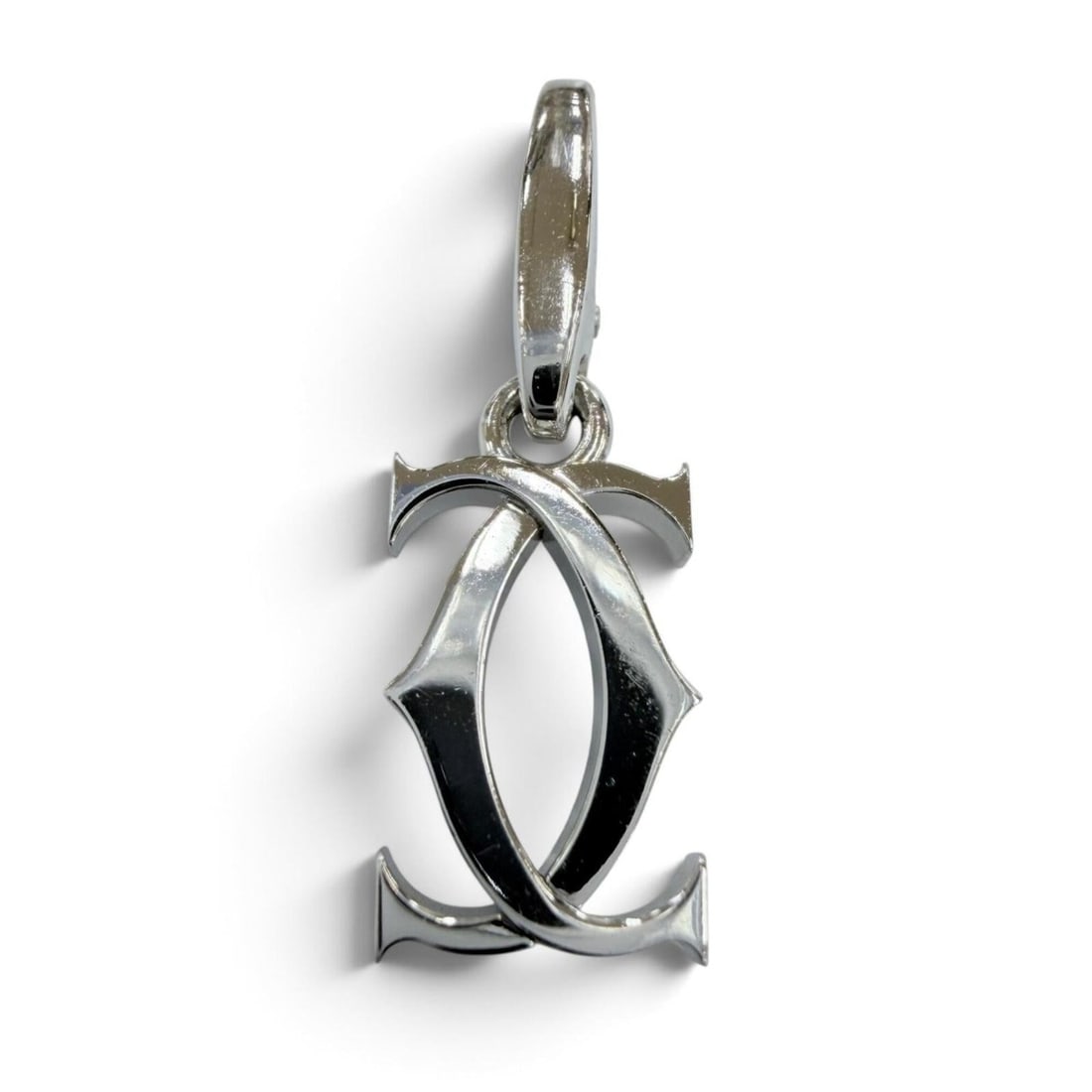 Cartier BR1846 2C Charm 750 (WG) Pendant Top White Gold Weight 2.43g Women's: --- Catalog ---Category: SizePendant Size: 23mm x 8mm / 0.9'' x 0.31''Category: DesignColor: White goldGender: WomenMaterial: White gold (18K)Necklace Type: PendantCategory: GeneralBrand: Cartier--- I