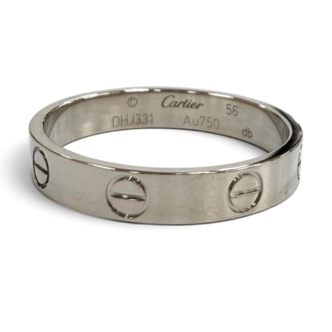 Cartier DHJ331 LOVE Ring Mini 750 (WG) Ring, White Gold, Size 56, Weight 3.58g, Women's: --- Catalog ---Category: SizeUS Size: 8Brand Size: 56Category: DesignType: Band ringColor: White goldGender: WomenMaterial: White gold (18K)Category: GeneralMPN: DHJ331Brand: Cartier--- Item List ---S