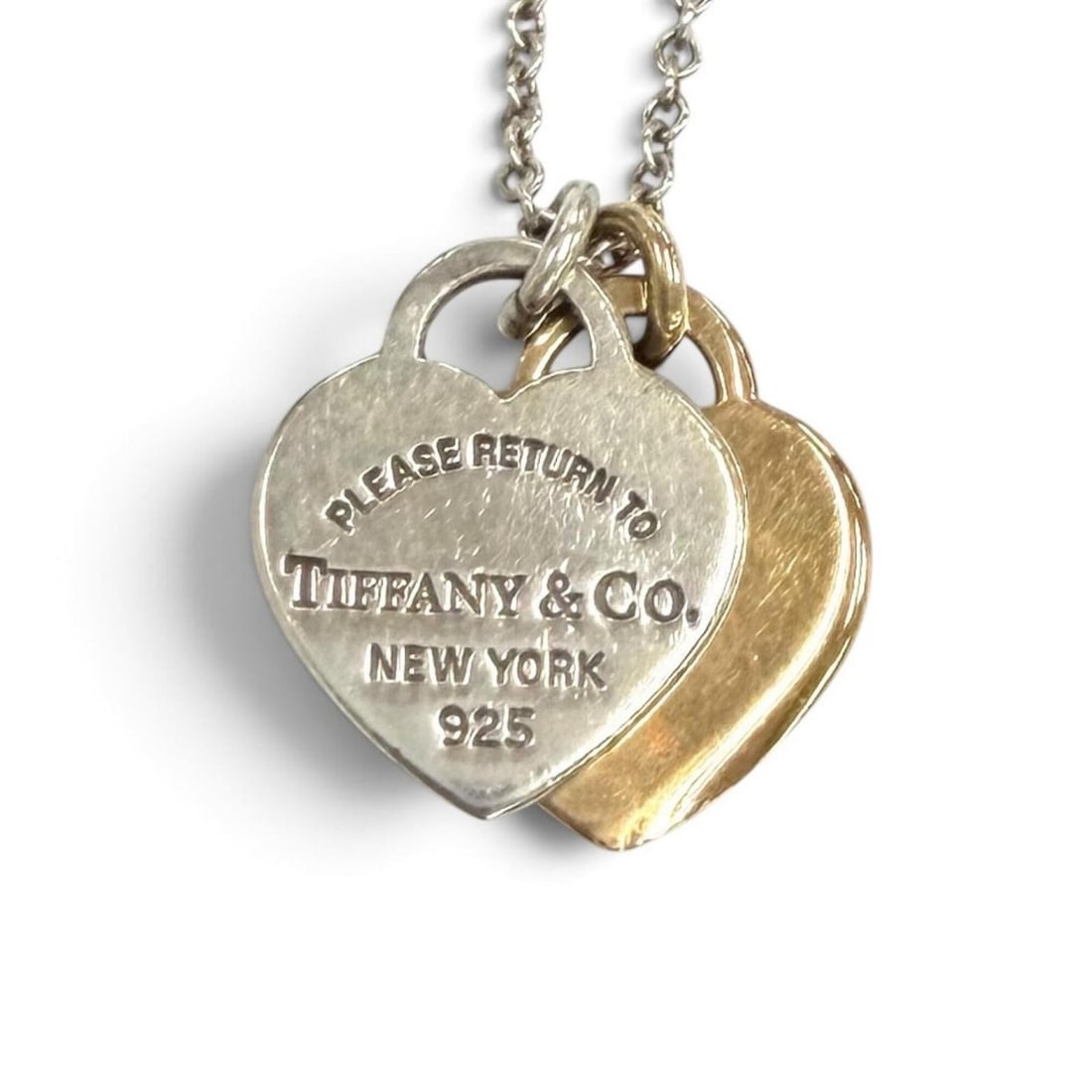 TIFFANY&Co. Tiffany & Co. Return to Mini Double Heart Tag Necklace AG925 750 (YG) Combination Silver: --- Catalog ---Category: SizePendant Size: 12mm x 9mm / 0.47'' x 0.35''Neck Circumference: 41 cm / 16.14''Category: DesignColor: Silver, Yellow goldGender: WomenMaterial: Silver 925, Yellow gold (18K)