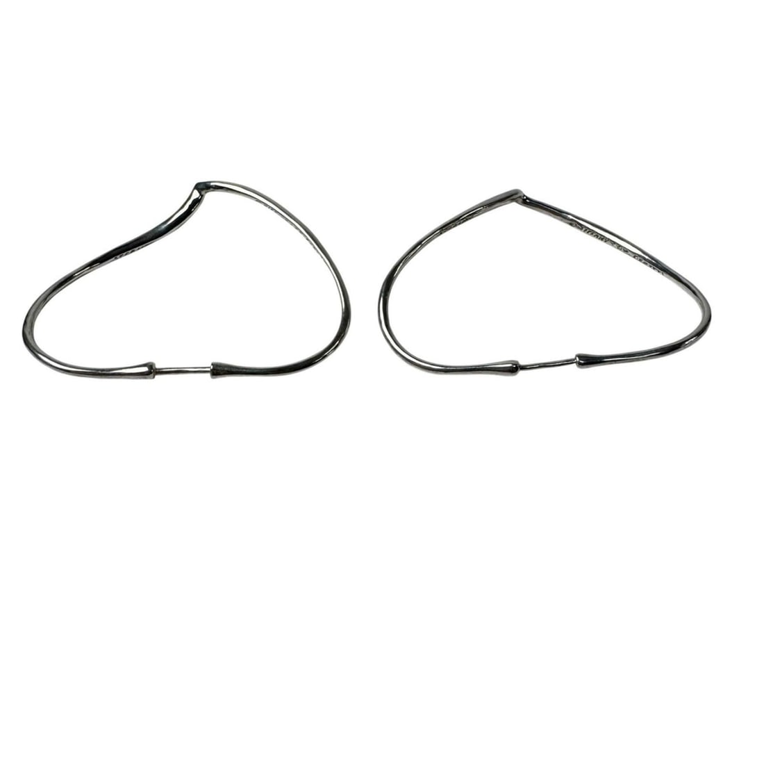 Tiffany & Co. Open Heart Hoop Earrings, Sterling Silver 925, by Elsa Peretti, for Women: --- Catalog ---Category: SizeSize (HxWxD): 40.00mm x 45.00mm / 1.57'' x 1.77''Category: DesignType: Hoop earringsColor: SilverGender: WomenMaterial: Sterling silverCategory: GeneralBrand: Tiffany--- I