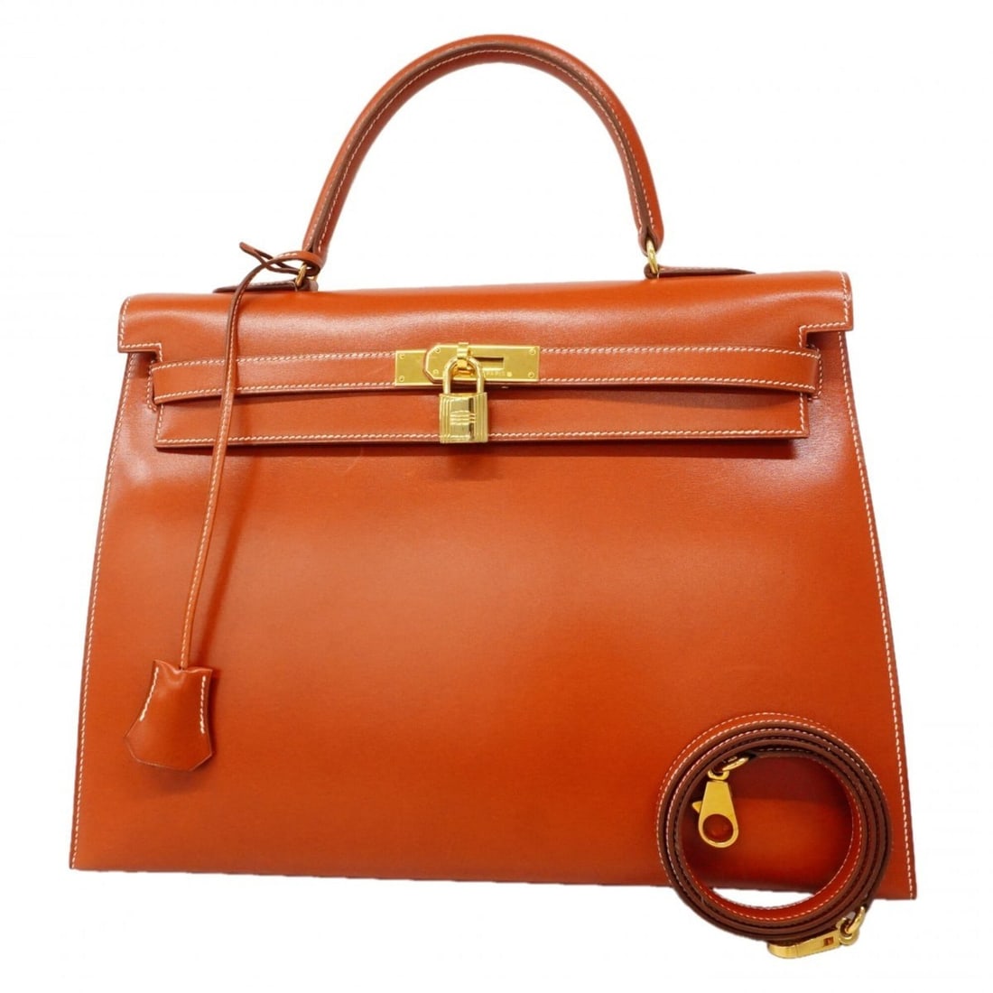 Hermes Kelly 35 Handbag, Box Calf Leather, Brick Color, ?Z Stamp, 2-way Bag for Women, P3084431: --- Catalog ---Category: SizeSize (HxWxD): 27cm x 35cm x 11.5cm / 10.62'' x 13.77'' x 4.52''Category: DesignType: HandbagColor: BriqueGender: WomenMaterial: Box calf leather Hardware Color: GoldCatego