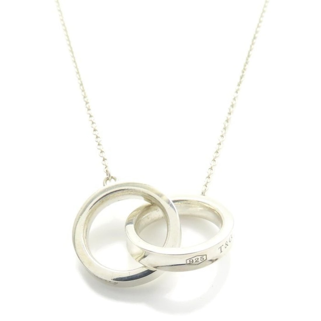 TIFFANY&Co. 1837 Interlocking Circle Necklace, Sterling Silver 925, Women's, Item No. 295850: --- Catalog ---Category: SizePendant Size: 14.5mm x 14.5mm / 0.57'' x 0.57''Neck Circumference: 41 cm / 16.14''Category: DesignColor: SilverGender: WomenMaterial: Silver 925Necklace Type: