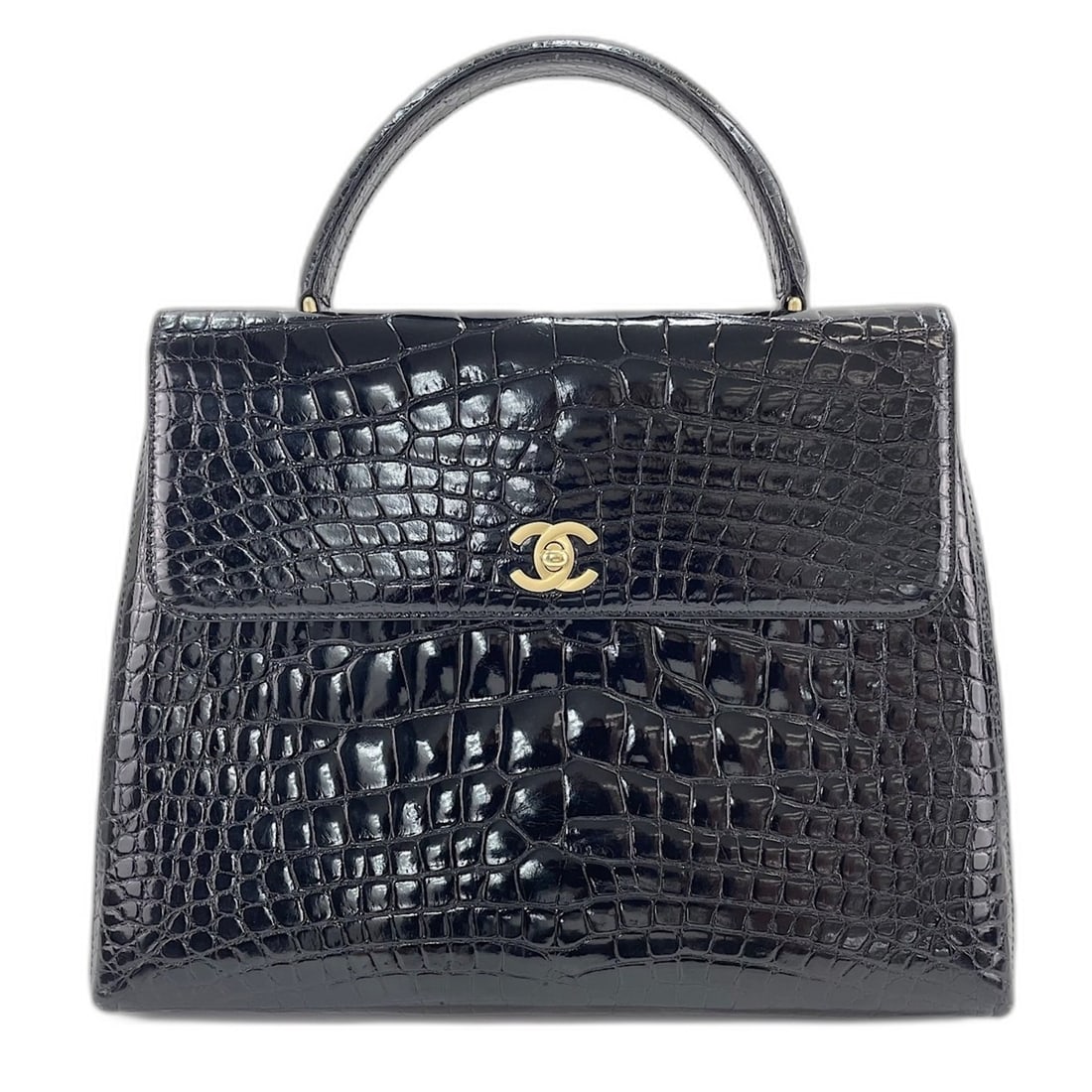 Chanel handbag with embossed Coco Mark, black.: --- Catalog ---Category: SizeHandle Drop: 8.50cm / 3.35''Size (HxWxD): 23cm x 30cm x 12cm / 9.05'' x 11.81'' x 4.72''Category: DesignType: HandbagColor: BlackGender: WomenMaterial: Leather