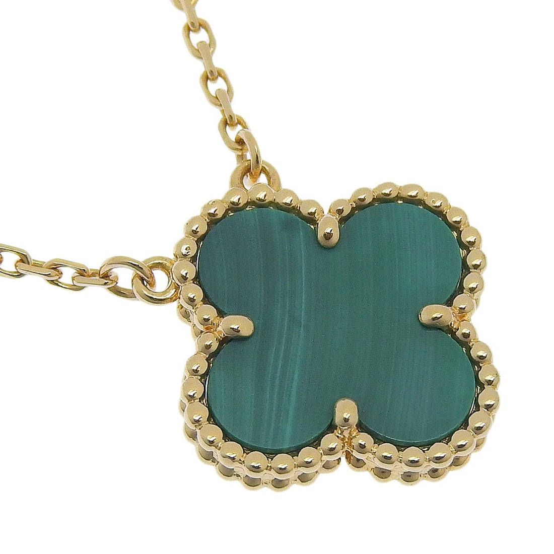 Van Cleef & Arpels Vintage Alhambra Necklace, Malachite, 18K Yellow Gold, Approx. 5.3g, Women's: --- Catalog ---Category: SizeWeight: 5.3g / 0.18oz.Pendant Size: 15mm x 15mm / 0.59'' x 0.59''Neck Circumference: 42 cm / 16.53''Category: DesignStone: MalachiteGender: WomenSeason: VintageMaterial: Y