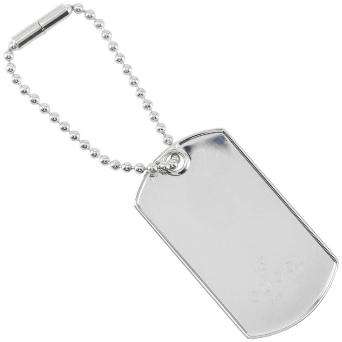 Gucci dog tag charm, sterling silver (925), unisex.: --- Catalog ---Category: SizeWeight: 22g / 0.77oz.Size (HxWxD): 49.00mm x 27.00mm / 1.93'' x 1.06''Category: DesignType: Handbag charmGender: Unisex,Women,MenMaterial: Silver 925Category: GeneralBrand