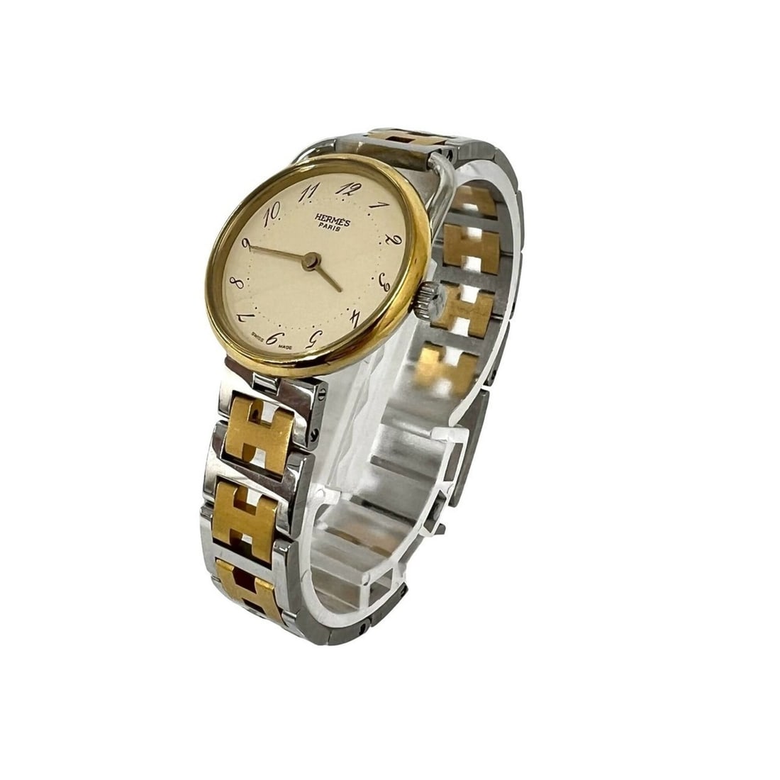 HERMES Arceau Stainless Steel GP Quartz Wristwatch, Silver/Gold, 21563: --- Catalog ---Category: SizeWrist Size: 14.5cm / 5.7''Case Diameter: 25mm / 0.98''Category: DesignType: WristwatchGender: WomenMaterial (Band): Gold plated, Stainless steelMaterial (Case): Gold plate