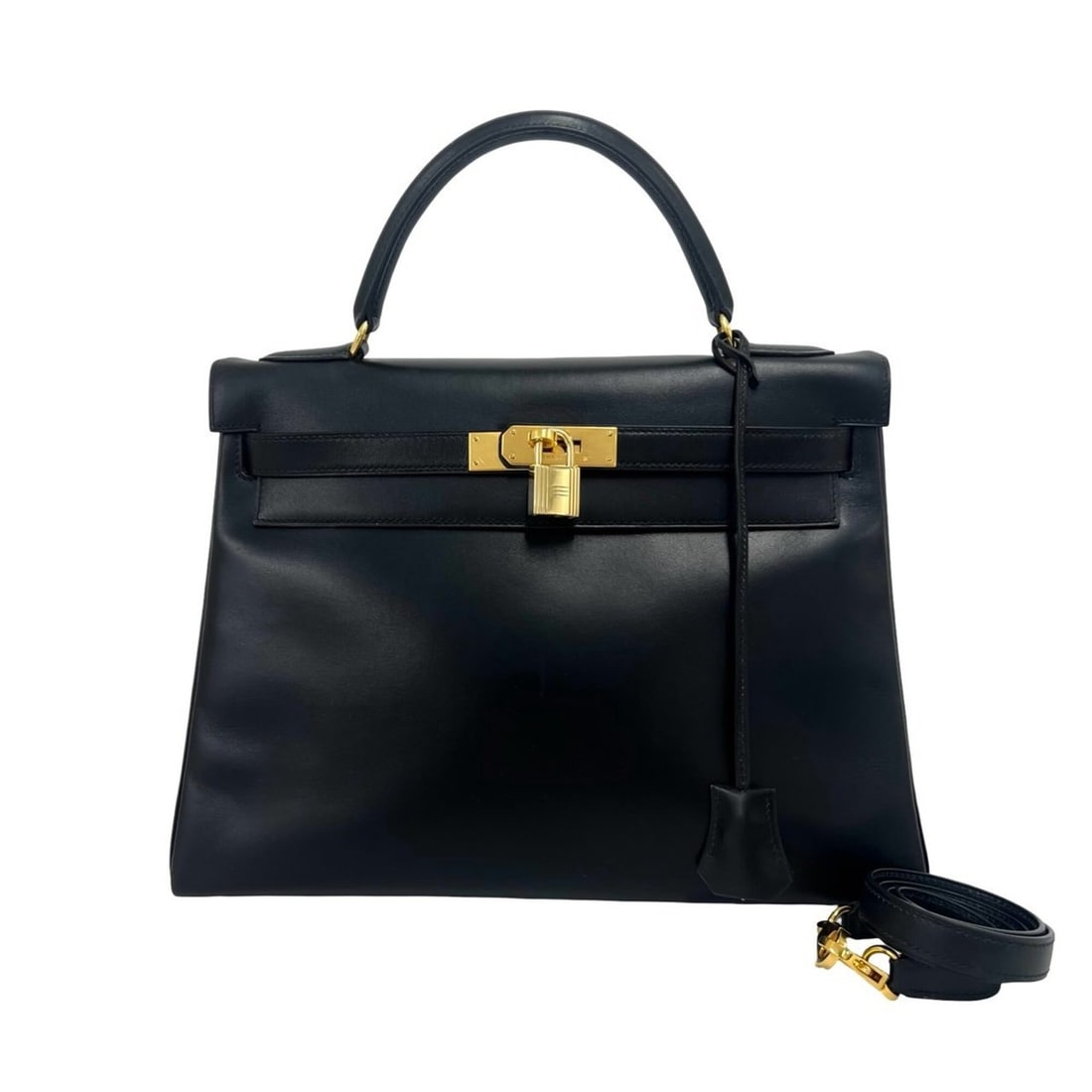 HERMES Vintage Kelly 32 Box Calf Leather 2-way Handbag/Shoulder Bag Black 603-3: --- Catalog ---Category: SizeSize (HxWxD): 32cm x 22cm x 12cm / 12.59'' x 8.66'' x 4.72''Category: DesignType: Handbag, Shoulder bagColor: BlackGender: WomenMaterial: Box calf leather Category: Genera