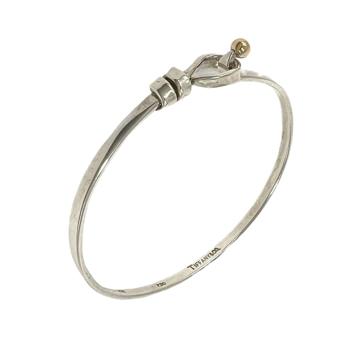TIFFANY&Co. Tiffany Vintage Hook & Eye Bracelet, Sterling Silver 925, 18K Yellow Gold, 33882: --- Catalog ---Category: SizeLength: 18.5cm / 7.28''Category: DesignType: Charm braceletColor: Gold, SilverGender: WomenMaterial: Silver 925, Yellow gold (18K)Category: GeneralBrand: Tiffany--- Item L