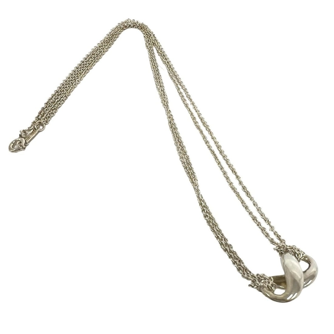 TIFFANY&Co. Tiffany Vintage Infinity Necklace, Sterling Silver 925 Pendant, 24834: --- Catalog ---Category: SizePendant Size: 8mm x 18mm / 0.31'' x 0.7''Neck Circumference: 40.2 cm / 15.82''Category: DesignColor: SilverGender: WomenMaterial: Silver 925Pendant Type: PendantNecklace T