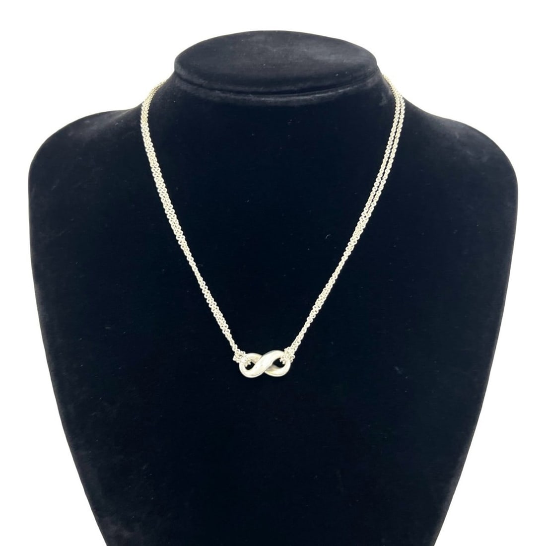 TIFFANY&Co. Tiffany Vintage Infinity Necklace, Sterling Silver 925, Accessory, Item Number 24911: --- Catalog ---Category: SizePendant Size: 9mm x 18mm / 0.35'' x 0.7''Neck Circumference: 39 cm / 15.35''Category: DesignColor: SilverGender: WomenMaterial: Silver 925Necklace Type: NecklaceCategory: 