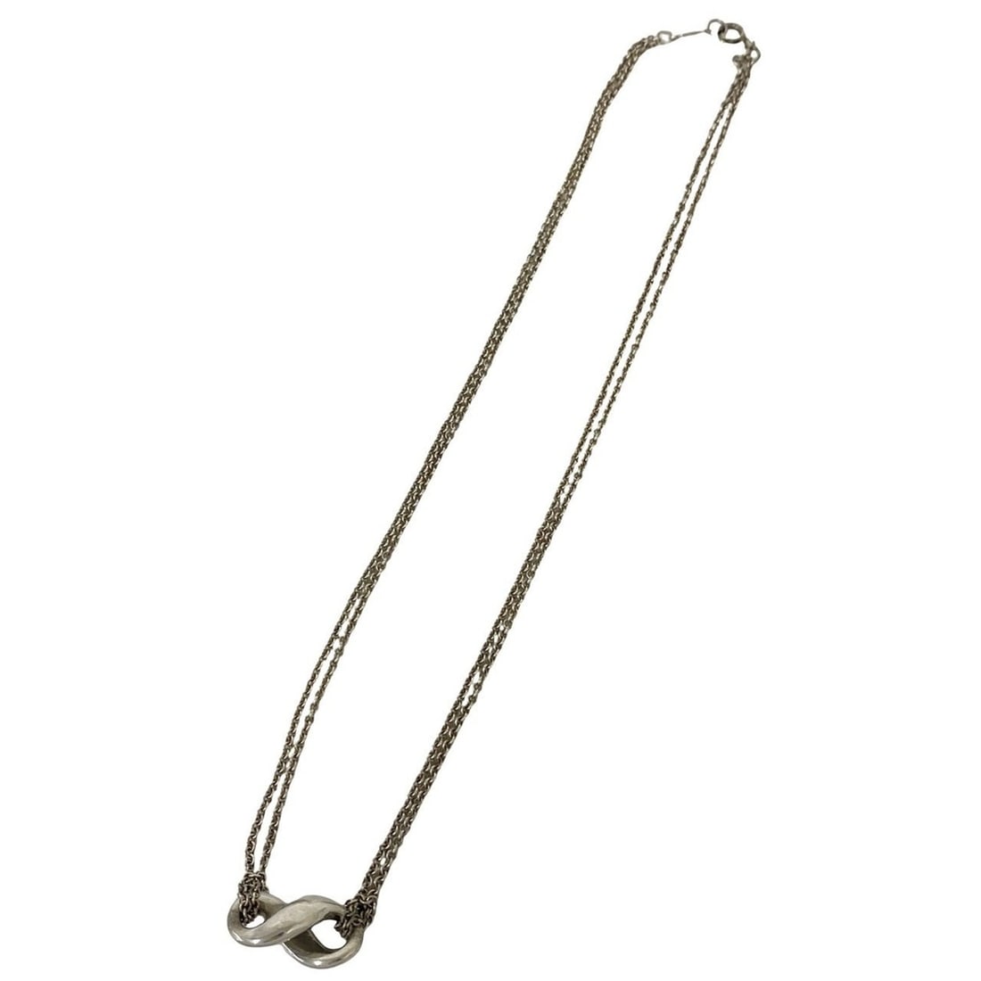 TIFFANY&Co. Tiffany Infinity Necklace, Sterling Silver 925, Accessory, Item Number 48649: --- Catalog ---Category: SizePendant Size: 10mm x 18mm / 0.39'' x 0.7''Neck Circumference: 40 cm / 15.74''Category: DesignColor: SilverGender: WomenMaterial: Silver 925Necklace Type: NecklaceCategory: