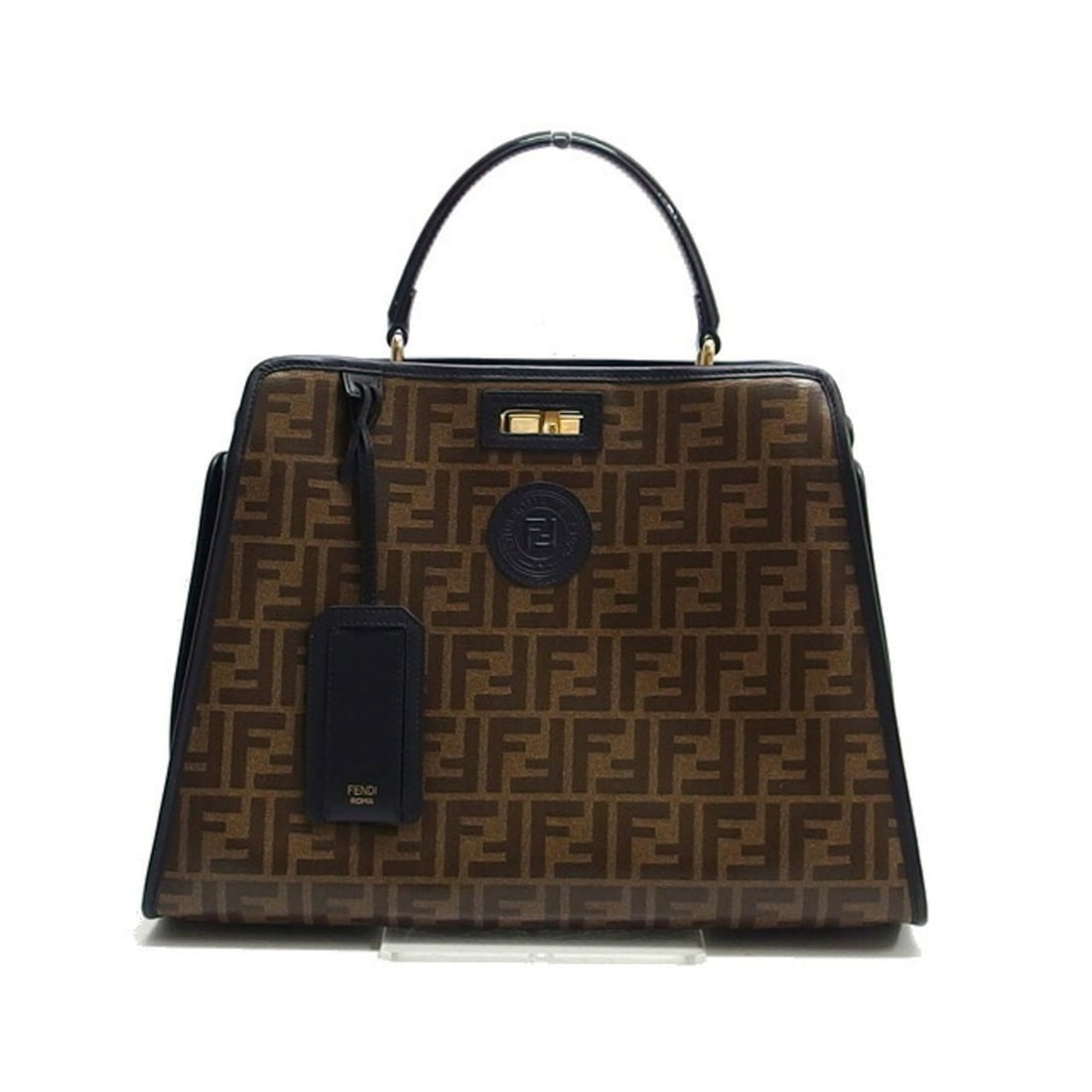 Fendi Peekaboo Zucca Pattern Definer Patent Handbag: --- Catalog ---Category: SizeWeight: 1.3kg / 2.86lb.Size (HxWxD): 27cm x 37cm x 14cm / 10.62'' x 14.56'' x 5.51''Handle Length: 33cm / 12.99''Category: DesignType: HandbagColor: Black, Brown, Dark
